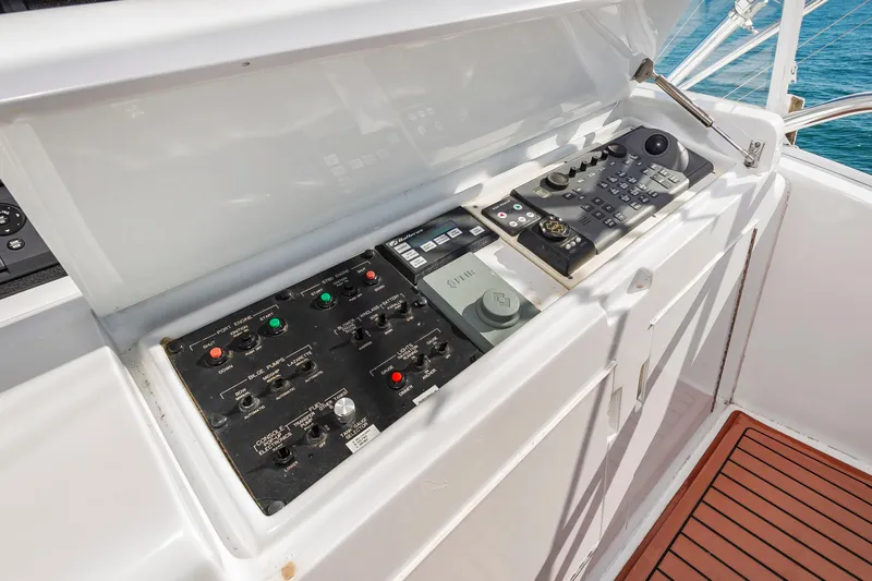 Sea Trader Yacht Photos Pics Control panel of 2005 Hatteras 60 Convertible yacht with navigation instruments.