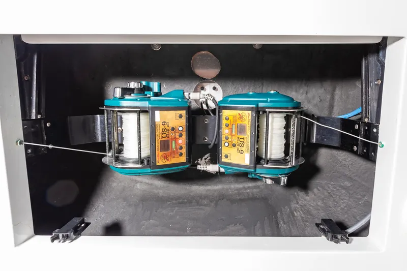 Sea Trader Yacht Photos Pics Fishing reels in a compartment of a 2005 Hatteras 60 Convertible yacht.