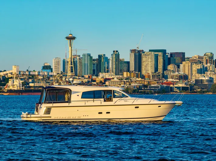 Treasure State Yacht Photos Pics Nimbus 405 Coupé 2022 yacht cruising with Seattle skyline in the background.