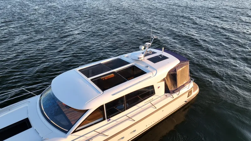 Treasure State Yacht Photos Pics Nimbus 405 Coup&eacute; 2022 yacht cruising on open water.