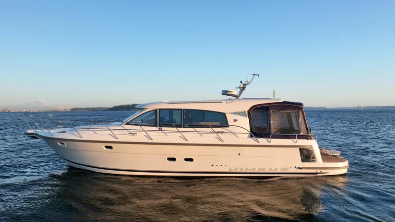 Treasure State Yacht Photos Pics 2022 Nimbus 405 Coup&eacute; yacht cruising on open water.