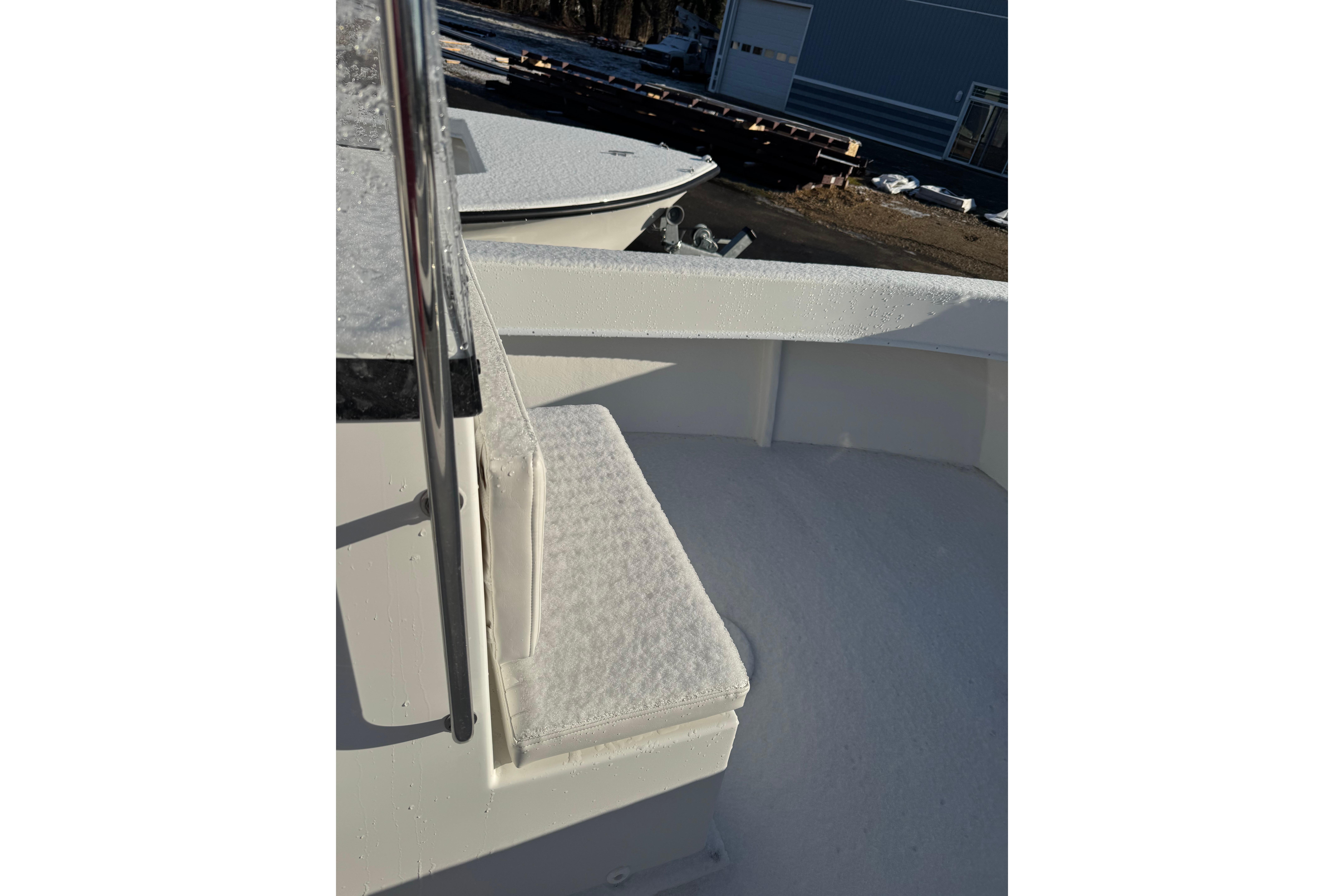 2026 C-Hawk 18 Center Console boat with frosty deck and seating area.