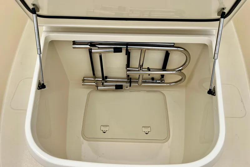  Yacht Photos Pics Open storage compartment with metal ladder in 2026 Scout 288 LXF boat.