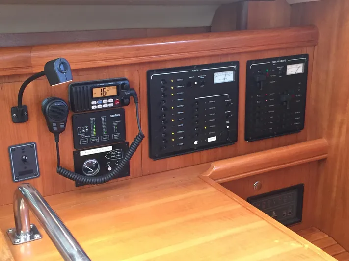 Sapphire Yacht Photos Pics Control panel of 2007 Hunter 41 Deck Salon yacht with communication and electrical systems.
