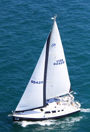 Sapphire Yacht Photos Pics 2007 Hunter 41 Deck Salon sailboat navigating blue ocean waters.