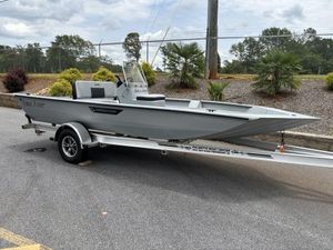 2025 SeaArk Shadow 18 Center Console boat on trailer, parked outdoors.