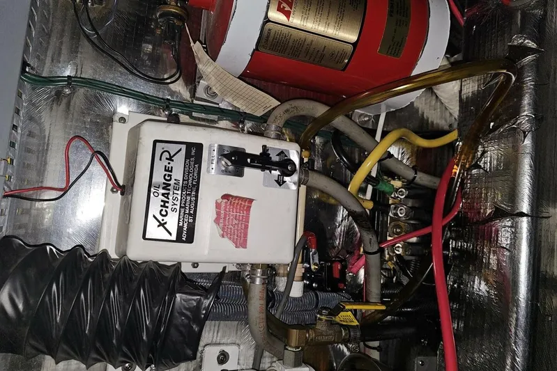  Yacht Photos Pics Engine compartment of 2005 Regal Commodore 4260 with oil change system and wiring.