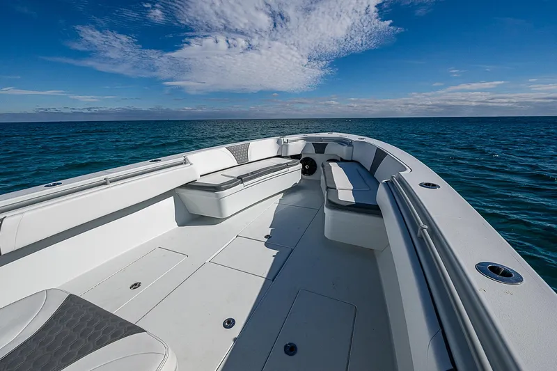  Yacht Photos Pics 2022 Contender 39 ST boat on open sea with clear skies.