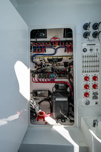  Yacht Photos Pics Electrical panel of 2022 Contender 39 ST boat, showcasing wiring and controls.