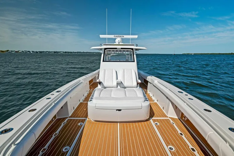  Yacht Photos Pics 2022 Barker Boatworks 40 HPC on water, featuring sleek design and spacious deck.
