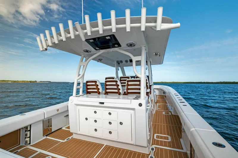  Yacht Photos Pics 2022 Barker Boatworks 40 HPC on water, featuring spacious deck and modern design.