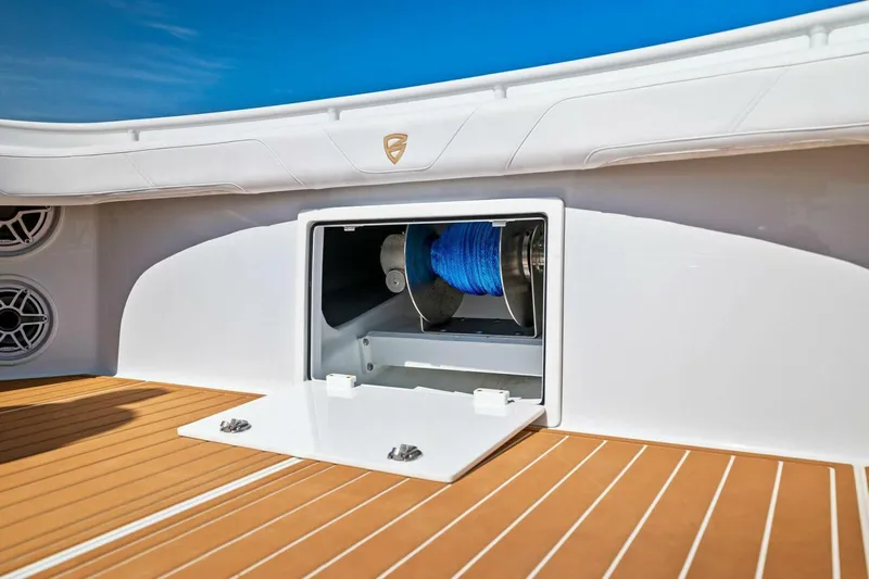  Yacht Photos Pics Barker Boatworks 40 HPC 2022, deck view with storage compartment and blue rope.