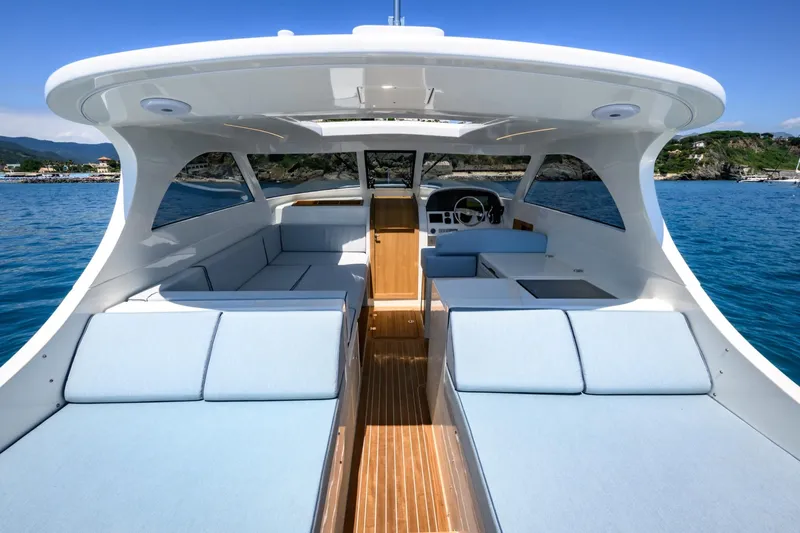 39 Outboard Yacht Photos Pics Luxurious Toy 39 outboard boat interior, 2025 model, with spacious seating and sleek design.