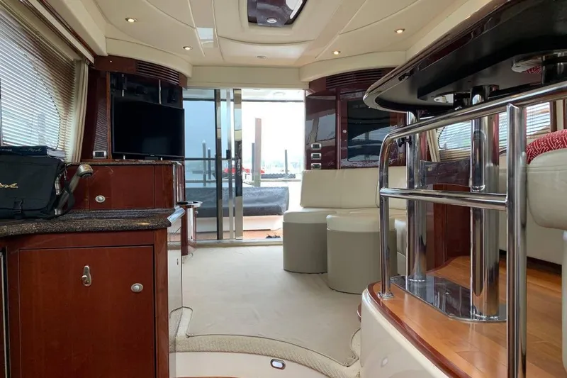  Yacht Photos Pics Luxurious interior of a 2007 Sea Ray 520 Sedan Bridge yacht with elegant furnishings.