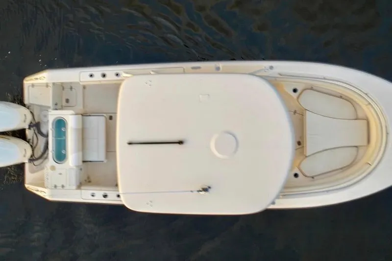  Yacht Photos Pics Overhead view of 2014 Pursuit S 280 Sport boat on water.
