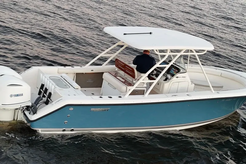  Yacht Photos Pics 2014 Pursuit S 280 Sport boat on water, featuring Yamaha engine.