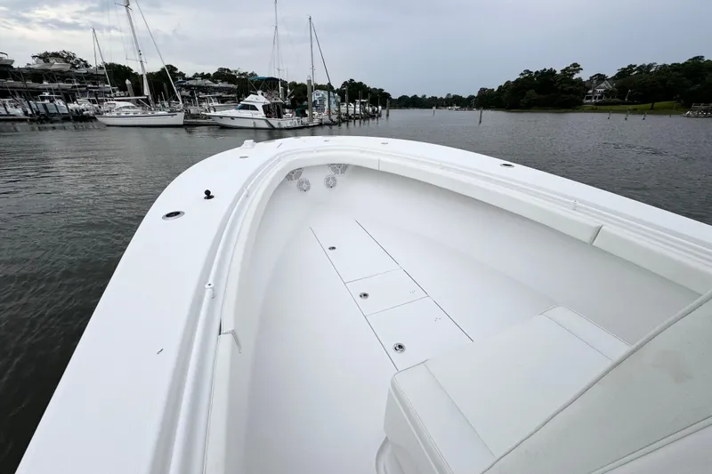  Yacht Photos Pics 2019 Onslow Bay 33 TE boat docked in a marina with sailboats in the background.