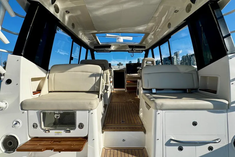 Days Ahead Yacht Photos Pics Interior view of 2022 Boston Whaler 405 Conquest boat with luxurious seating and modern design.