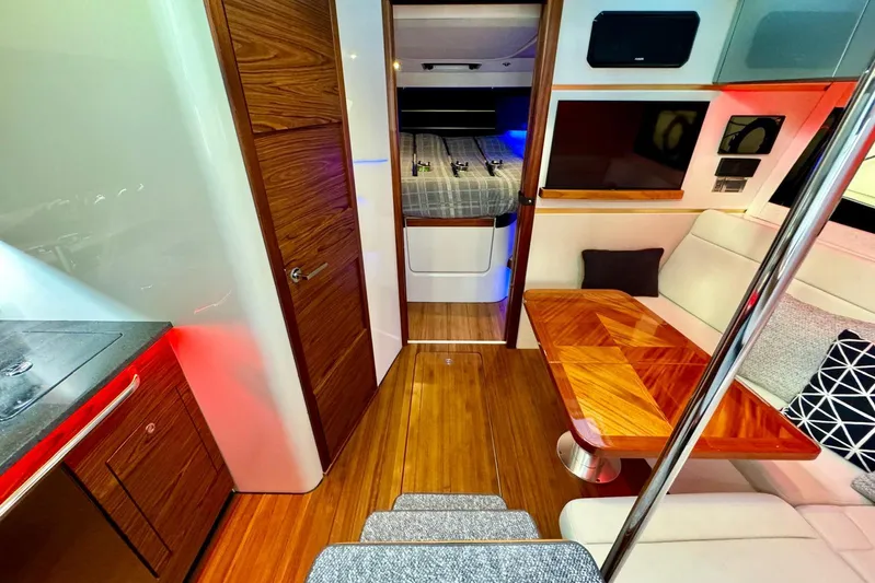 Days Ahead Yacht Photos Pics Luxurious interior of 2022 Boston Whaler 405 Conquest with wood accents and modern amenities.