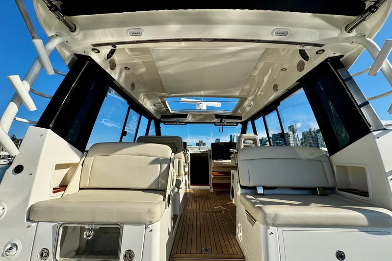 Days Ahead Yacht Photos Pics 2022 Boston Whaler 405 Conquest interior with luxurious seating and modern design.