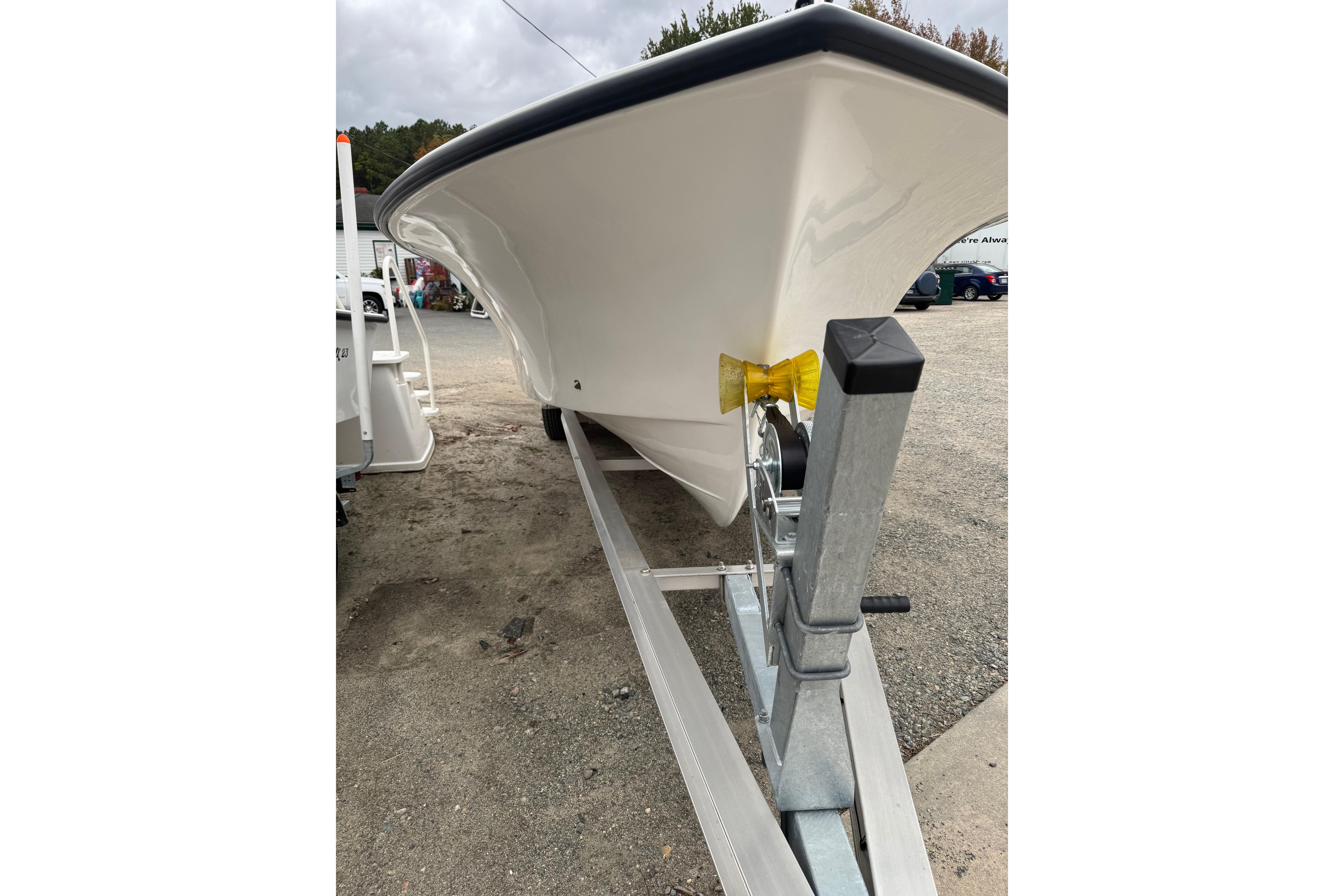 2026 C-Hawk 26 Center Console boat on trailer, front view.