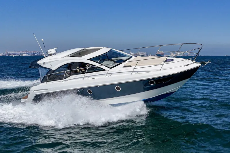  Yacht Photos Pics 2014 Beneteau Gran Turismo 38 yacht cruising on open water.
