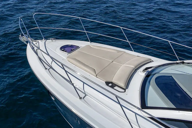  Yacht Photos Pics 2014 Beneteau Gran Turismo 38 yacht with sunbathing deck on open sea.