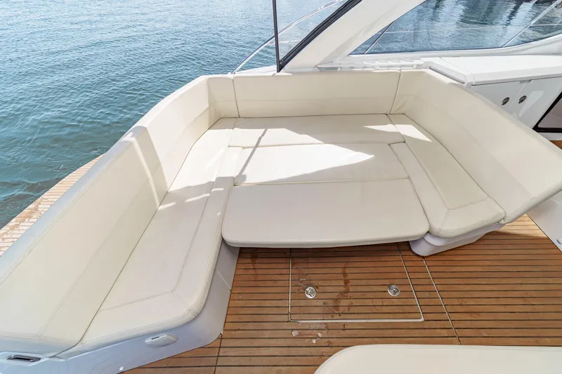  Yacht Photos Pics Luxurious seating area on 2014 Beneteau Gran Turismo 38 yacht, with elegant white cushions.