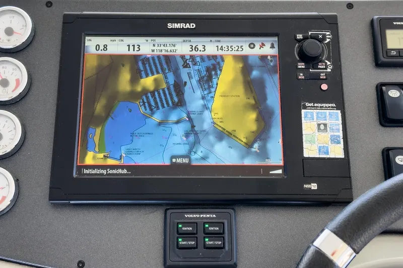  Yacht Photos Pics Simrad navigation display on 2014 Beneteau Gran Turismo 38 yacht dashboard.