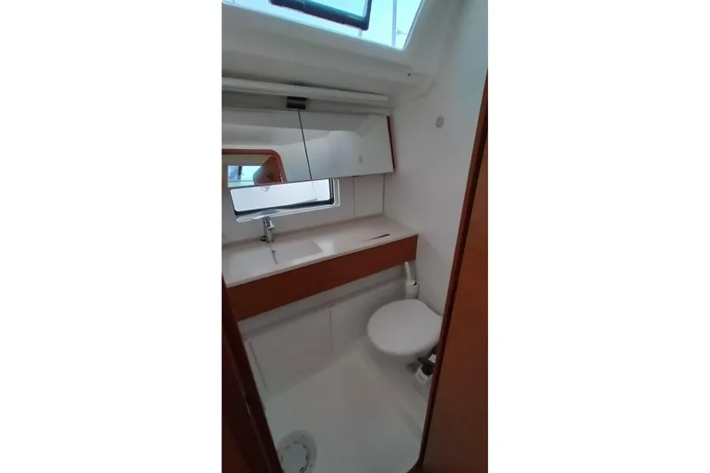  Yacht Photos Pics Bathroom interior of 2024 Dufour 44 yacht, featuring modern fixtures and sleek design.