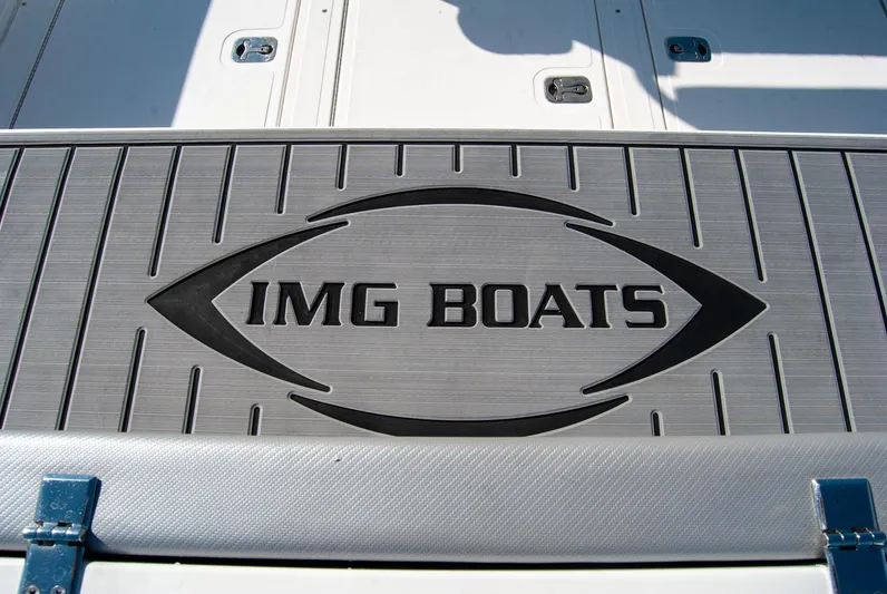  Yacht Photos Pics IMG Boats logo on deck of IMG 40 model, 2021.