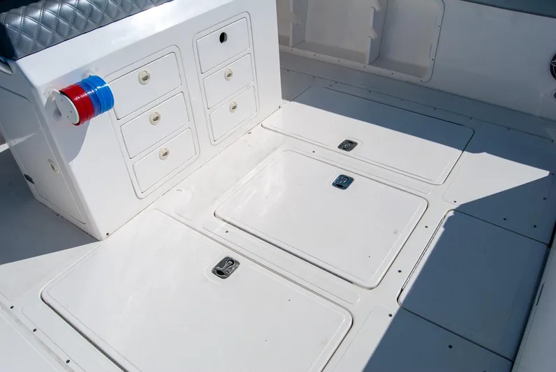  Yacht Photos Pics Boat deck with storage compartments and seating, featuring IMG 40 model, 2021.