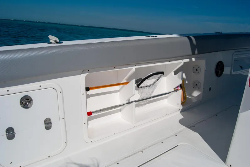  Yacht Photos Pics Boat storage compartment with fishing gear on a sunny day, IMG 40 model, 2021.