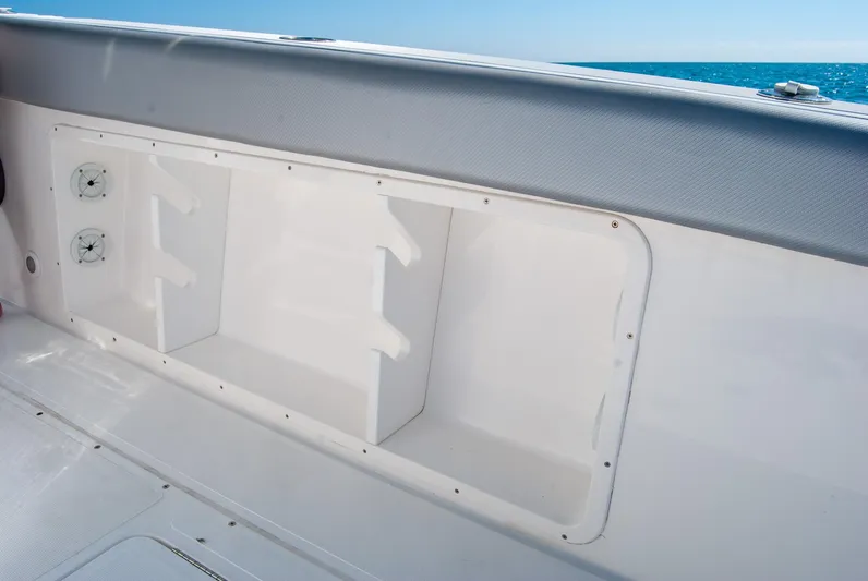  Yacht Photos Pics Boat storage compartment with open shelves, ocean view in background, IMG 40 model, 2021.