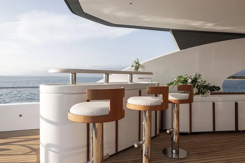 Yacht Photos Pics Luxurious deck bar on 2024 Azimut Magellano 30M yacht with ocean view.