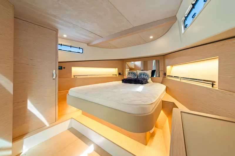  Yacht Photos Pics Luxurious interior of 2024 Solaris Power 44 yacht with modern bedroom design.