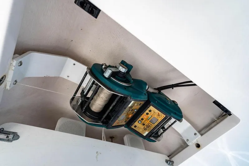 Reel Southern Yacht Photos Pics Fishing reel mechanism on a 2006 Viking 56 Convertible yacht, showcasing intricate details.