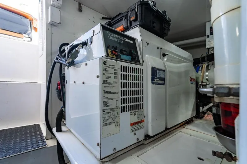 Reel Southern Yacht Photos Pics Cummins Onan generator inside a 2006 Viking 56 Convertible yacht engine room.