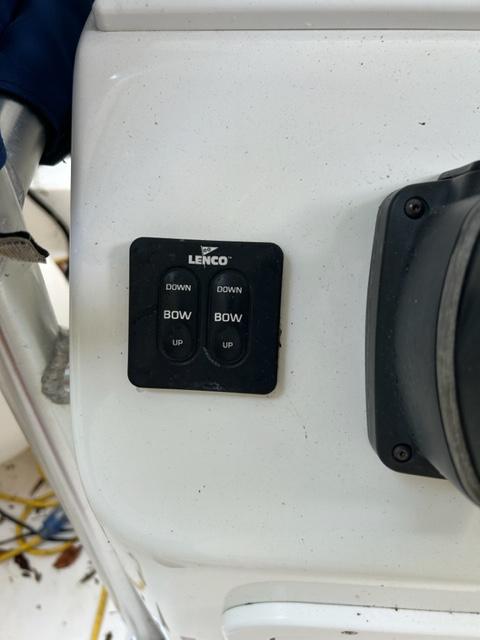 Lenco trim tab control on 2000 Regulator 23' Center Console boat dashboard.