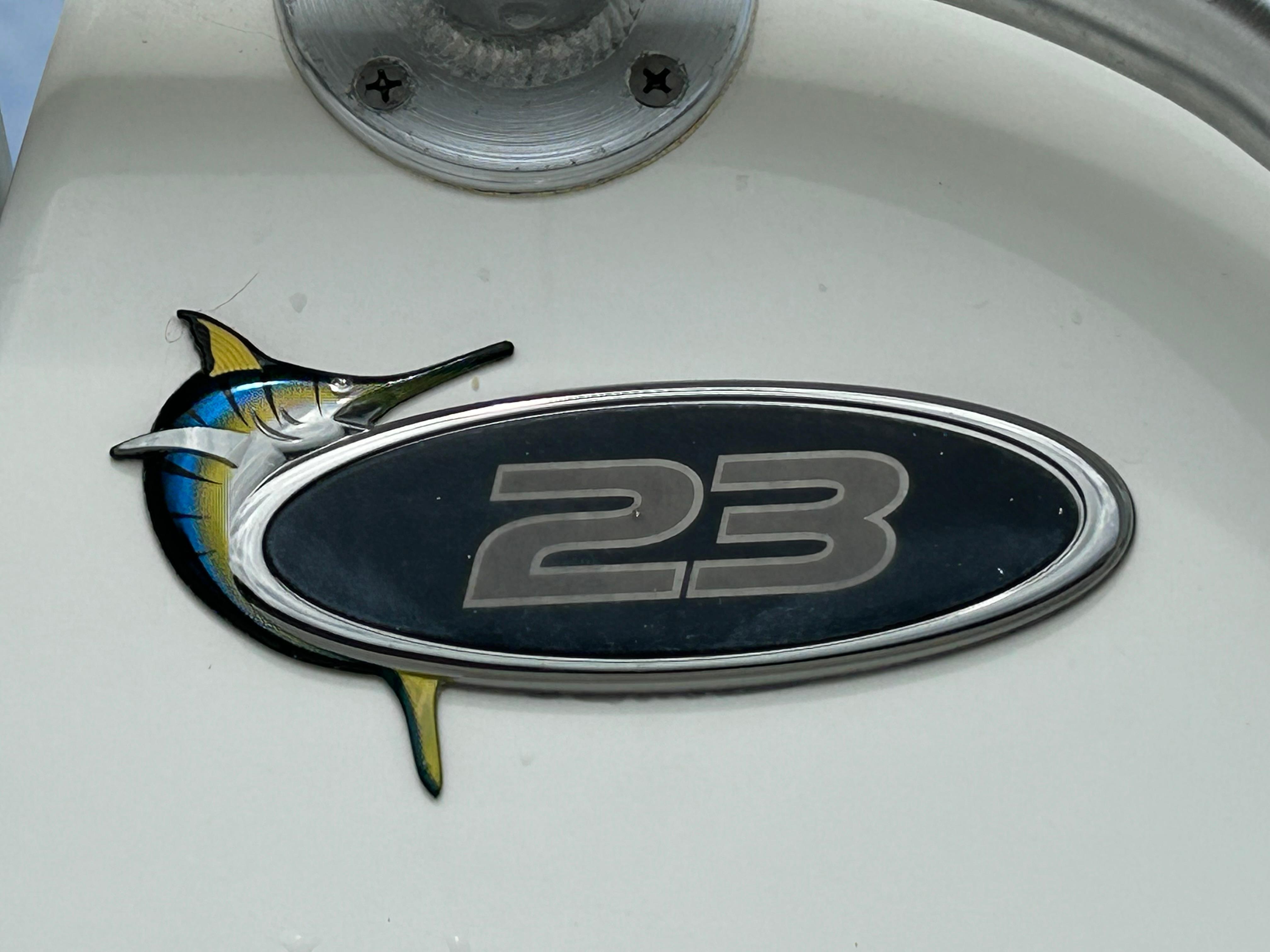 Regulator 23' Center Console boat emblem with marlin design, year 2000 model.