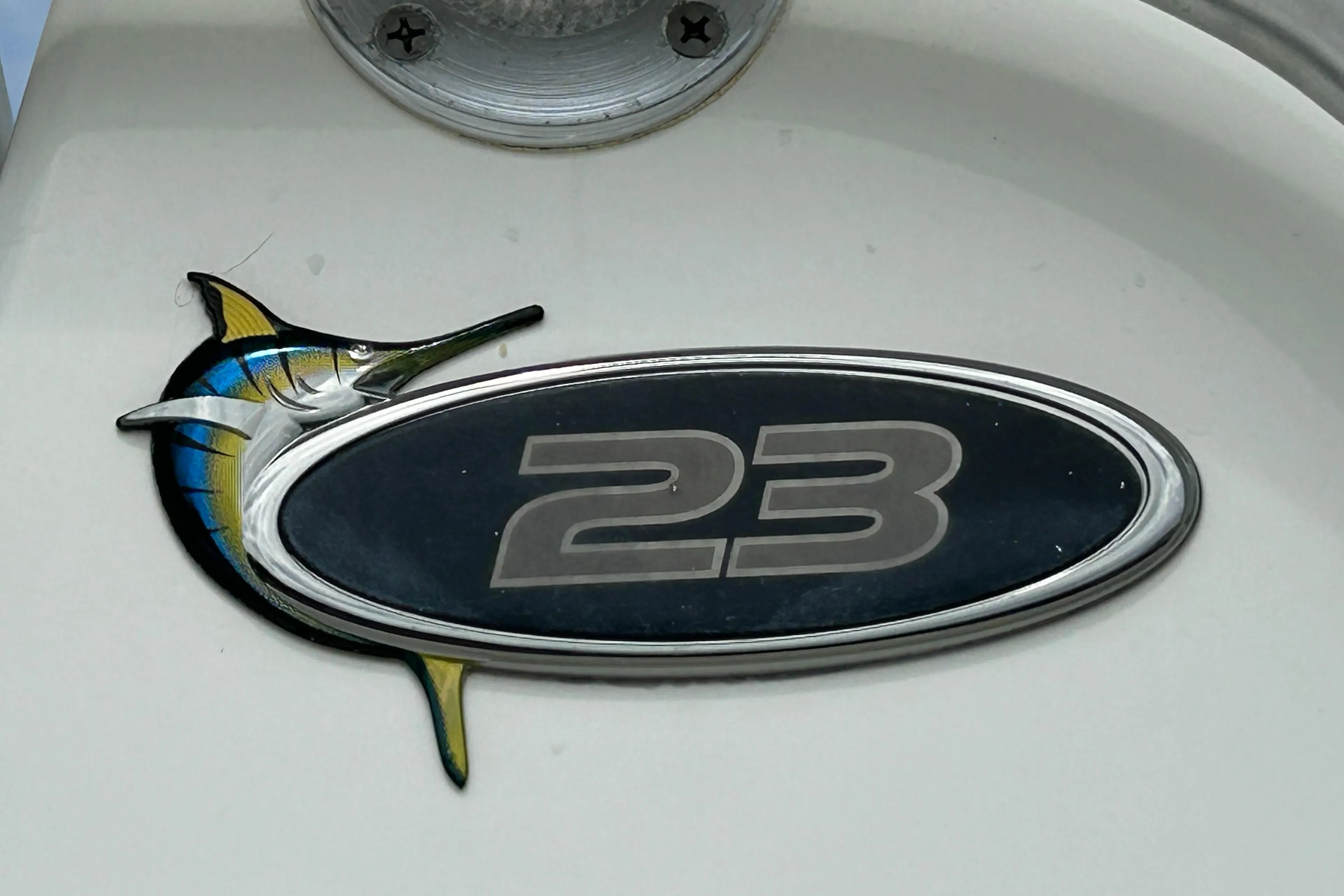 Regulator 23' Center Console boat emblem with marlin design, year 2000 model.