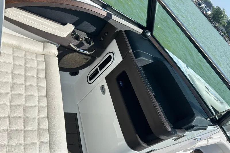  Yacht Photos Pics Interior of 2019 Cobalt R30 boat with white seating and cup holders.
