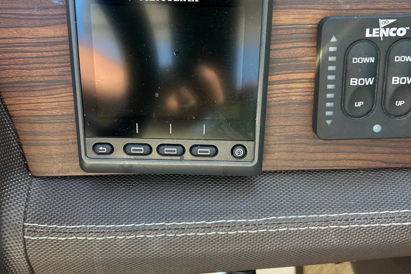  Yacht Photos Pics Control panel of a 2019 Cobalt R30 boat with Lenco trim tab switches.