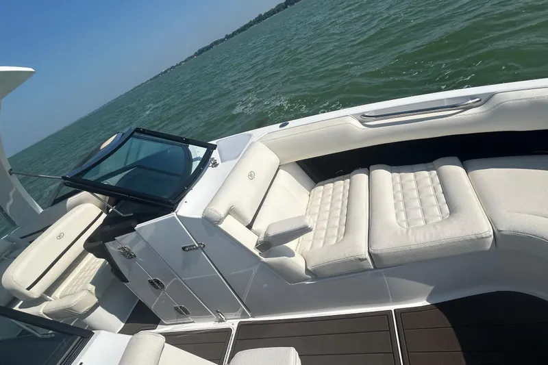  Yacht Photos Pics 2019 Cobalt R30 boat with luxurious white seating on a sunny day.