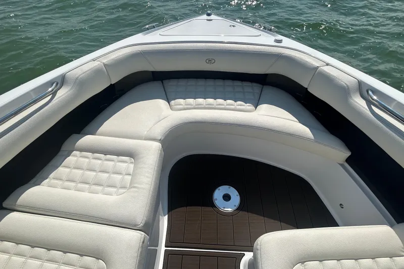  Yacht Photos Pics Luxurious seating area on a 2019 Cobalt R30 boat, with elegant white upholstery.