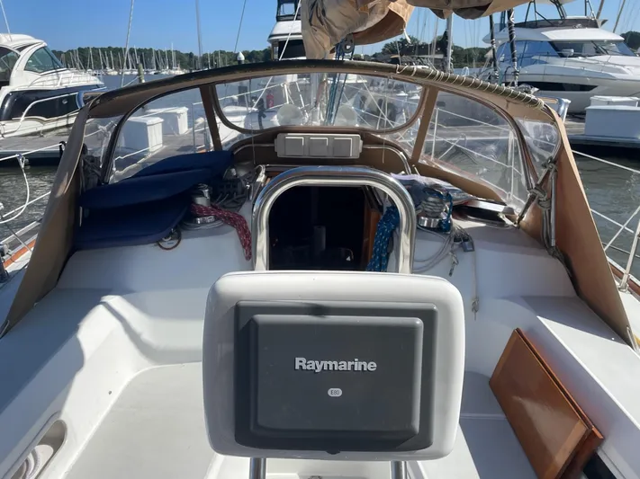 Caribou Yacht Photos Pics Cockpit of 2001 Sabre 402 sailboat with Raymarine navigation system.