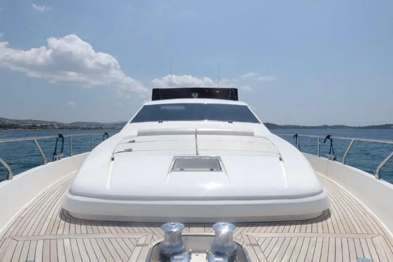 Ukiyo Yacht Photos Pics 2002 Ferretti Yachts 68 on open water, showcasing sleek deck design and luxury features.