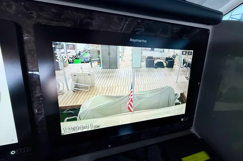 Seas The Day Yacht Photos Pics Raymarine display on 2014 Sea Ray 580 Sundancer showing dock view and depth reading.