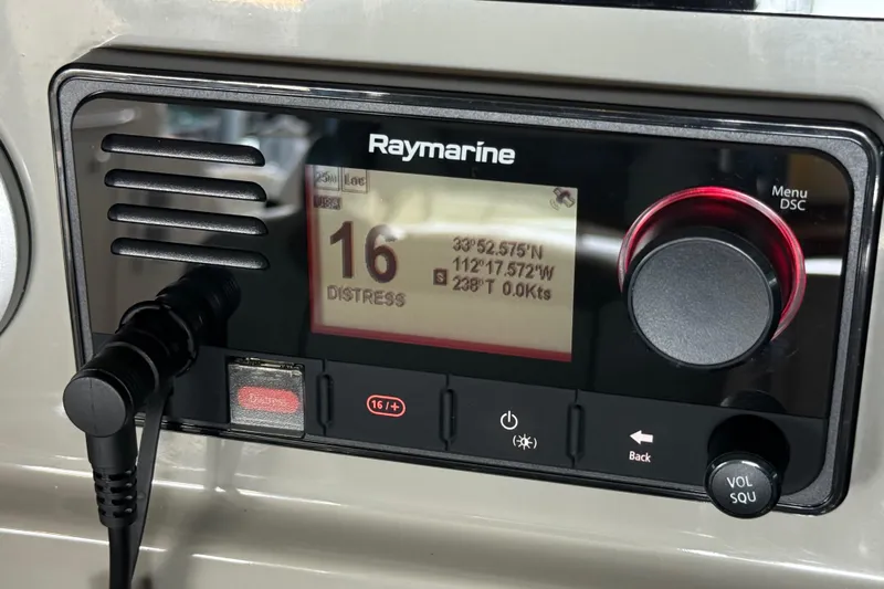 Seas The Day Yacht Photos Pics Raymarine marine radio on 2014 Sea Ray 580 Sundancer displaying distress signal coordinates.