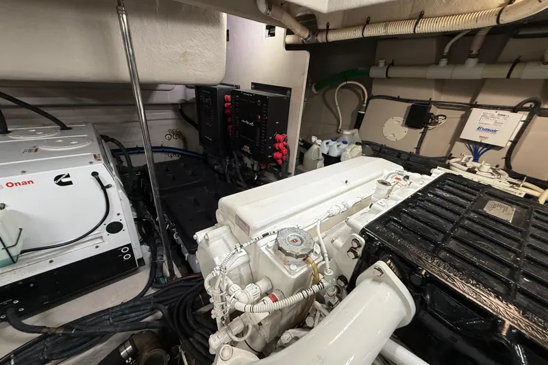 Seas The Day Yacht Photos Pics Engine room of 2014 Sea Ray 580 Sundancer with Cummins Onan generator and wiring.